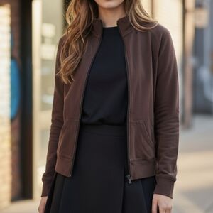 Brown zip up hoodie.